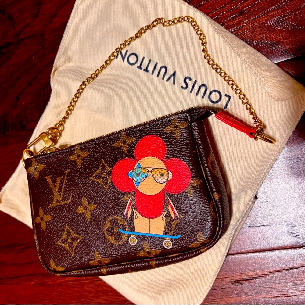 SOLD Louis Vuitton Limited Edition Monogram Vivienne Mini Pochette